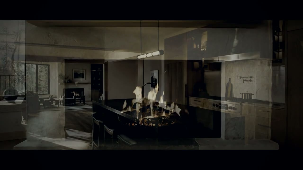 Finished lower-level living space with a stone island and a fireplace beyond